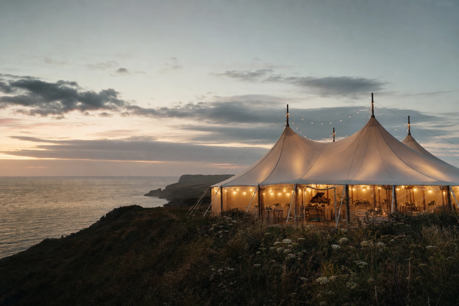 A coastal marquee at dusk · Cornwall